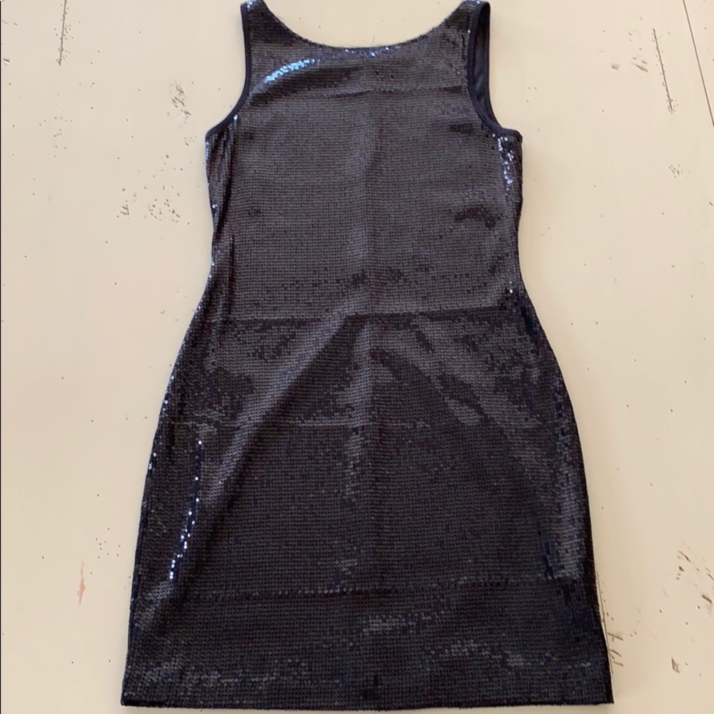 Black sequins party dress.